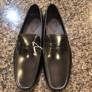 Tod’s black loafers, brand new